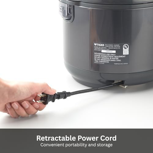 Black 5.5 cup rice cooker with nonstick pot — photo 4